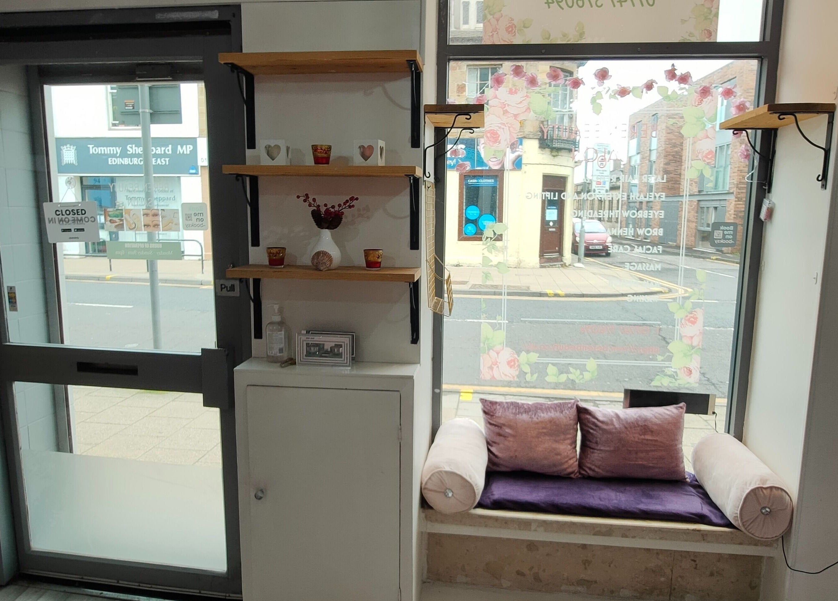 Inviting window nook with soft cushions at Beren Beauty Salon, Edinburgh, Scotland, GB.