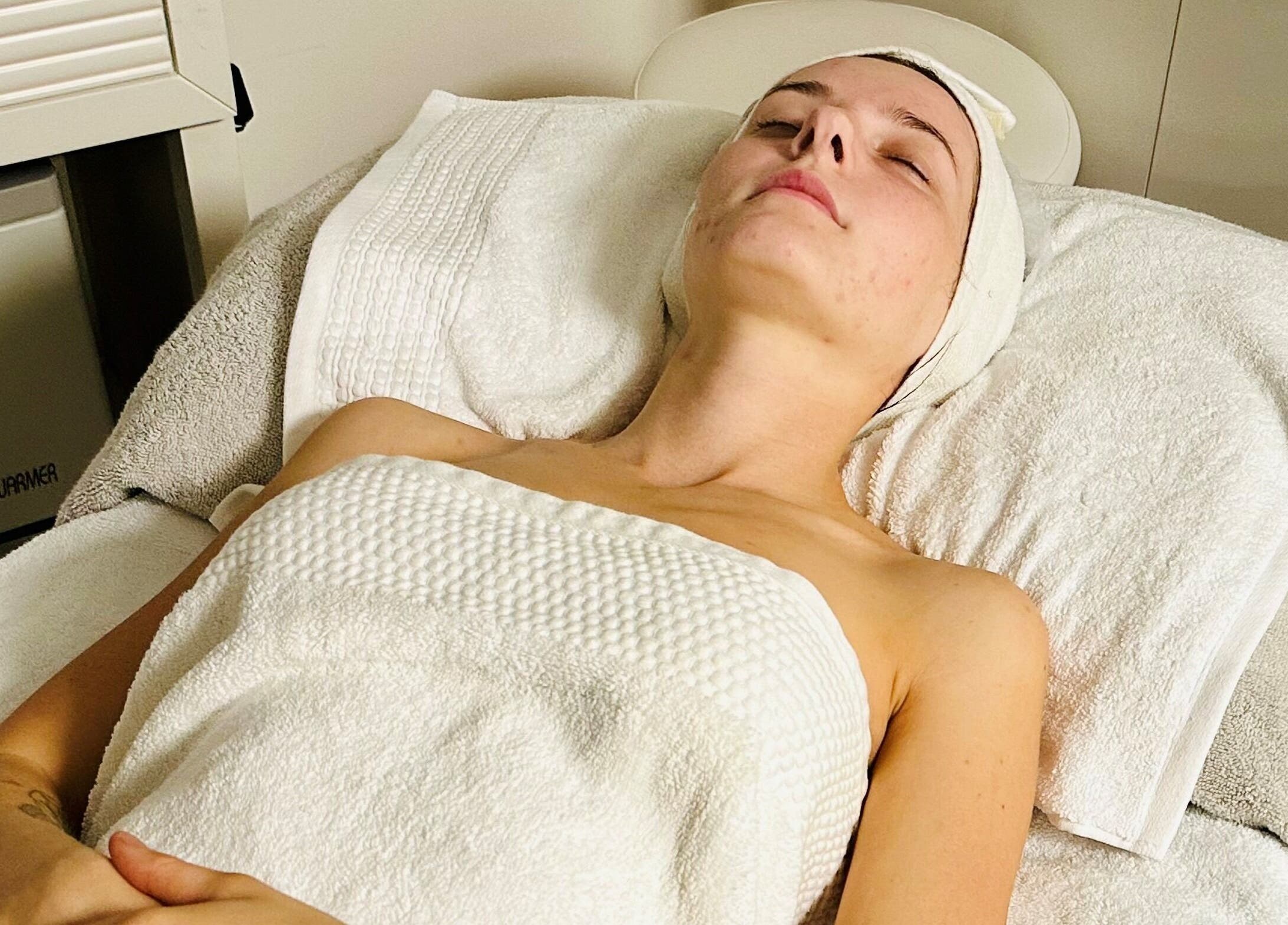 A client enjoys a relaxing facial treatment at AskinCo, Mooloolaba, Queensland, AU.