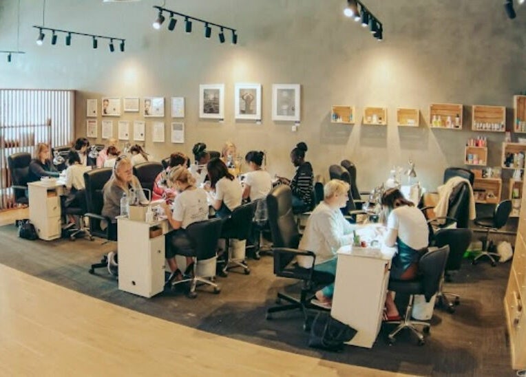 Bustling salon scene at The Nail Bar Murray Bridge, Murray Bridge, South Australia, AU, with clients and technicians.