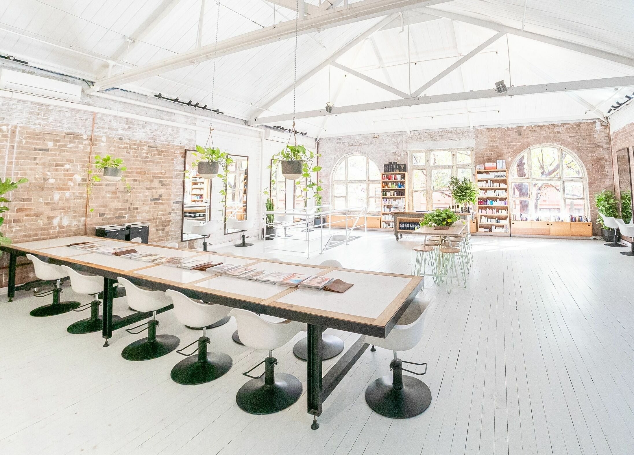 E+Co - Kippax Street in Surry Hills, New South Wales, features a bright, spacious loft with natural lighting and greenery.