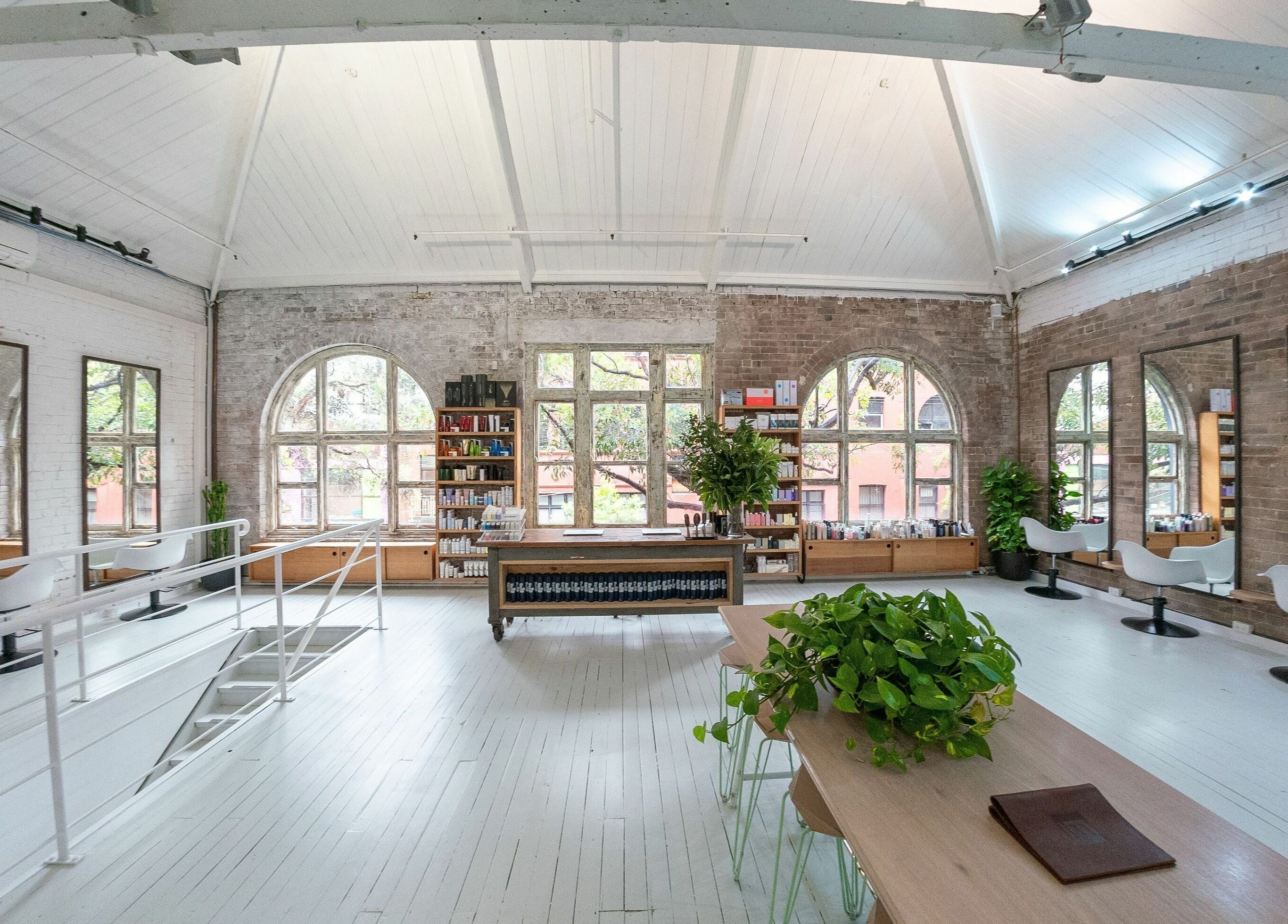 Bright, spacious beauty salon at E+Co - Kippax Street, Surry Hills, New South Wales, AU with rustic charm.
