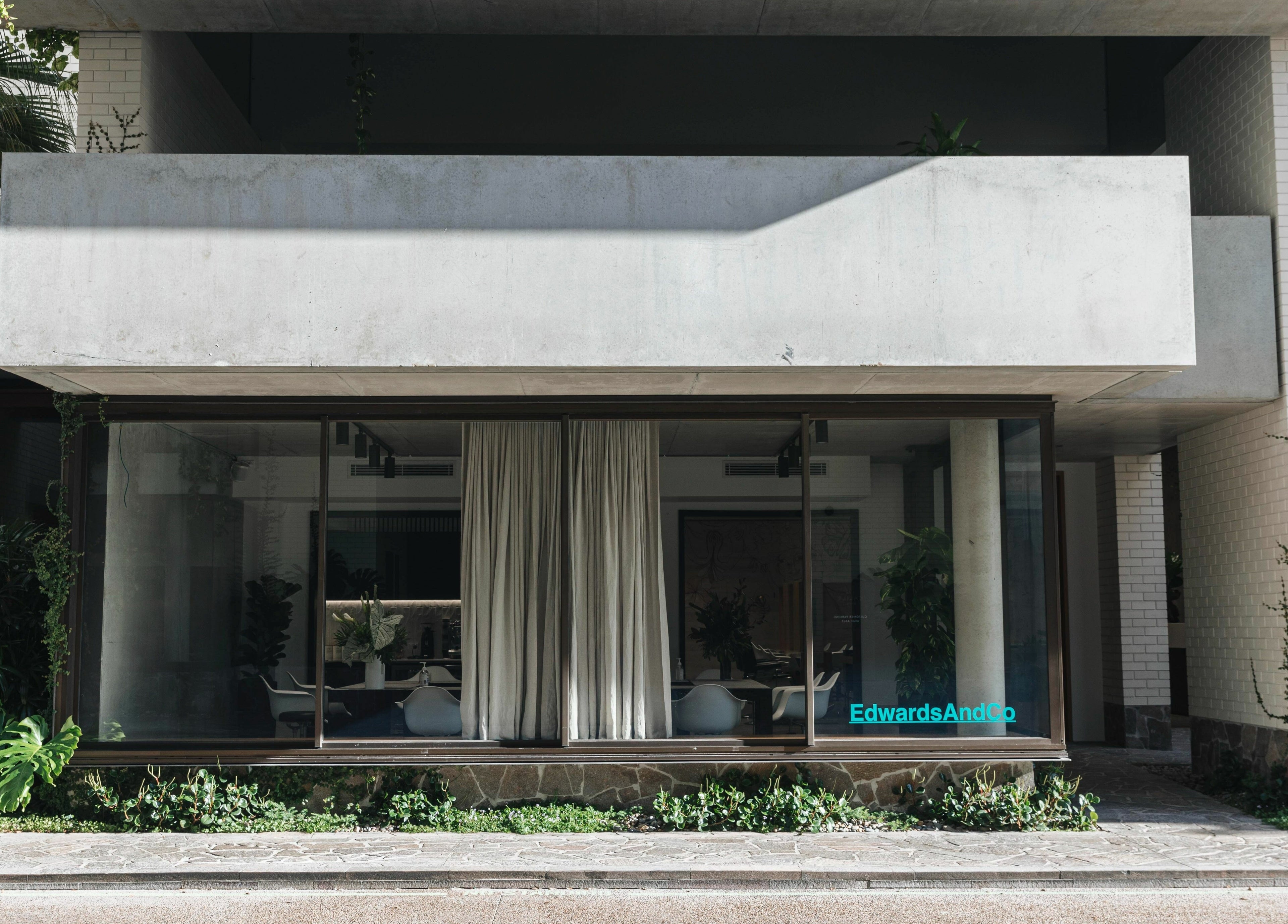 Front view of E+Co - Fortitude Valley, elegant entrance with plants in Fortitude Valley, Queensland, AU.
