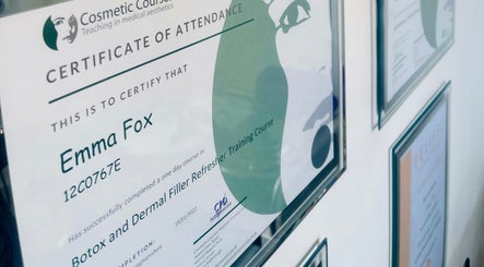 Certificates on display at Emma Fox Aesthetics, Heybridge, England, GB, showcasing aesthetic expertise.