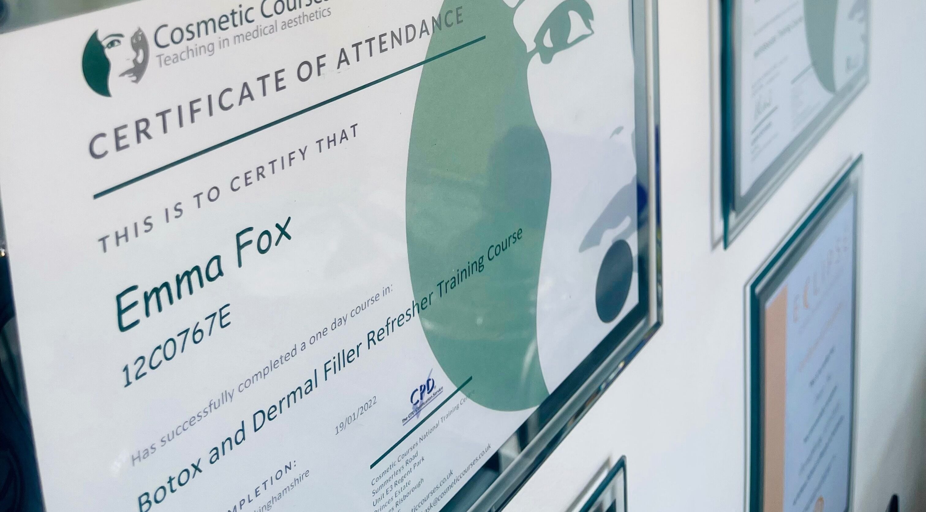 Certificates displayed at Emma Fox Aesthetics, Heybridge, England, GB, showcasing accomplishments.