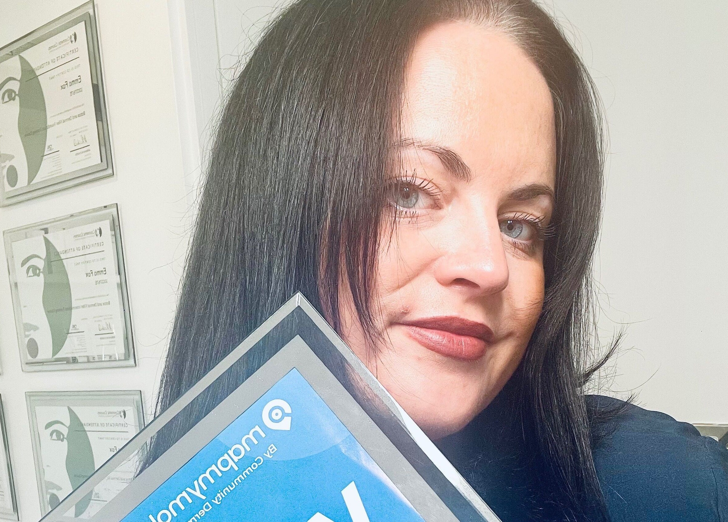 Professional at Emma Fox Aesthetics in Heybridge, England, GB showcasing certificates of achievement.