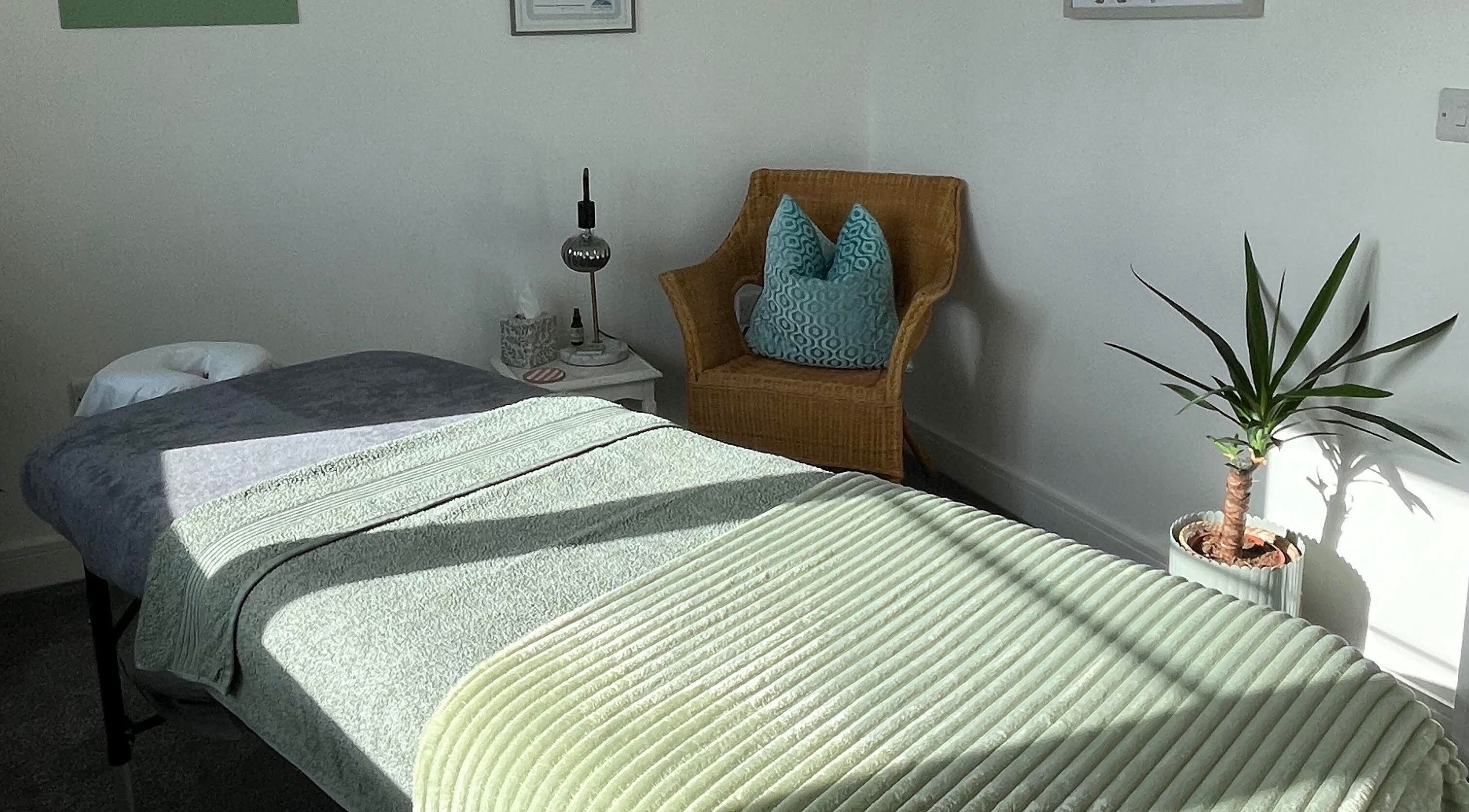 Relaxing massage room at Alpas Massage Therapy - Bridge of Earn, featuring cozy decor in Bridge Of Earn, Scotland, GB.