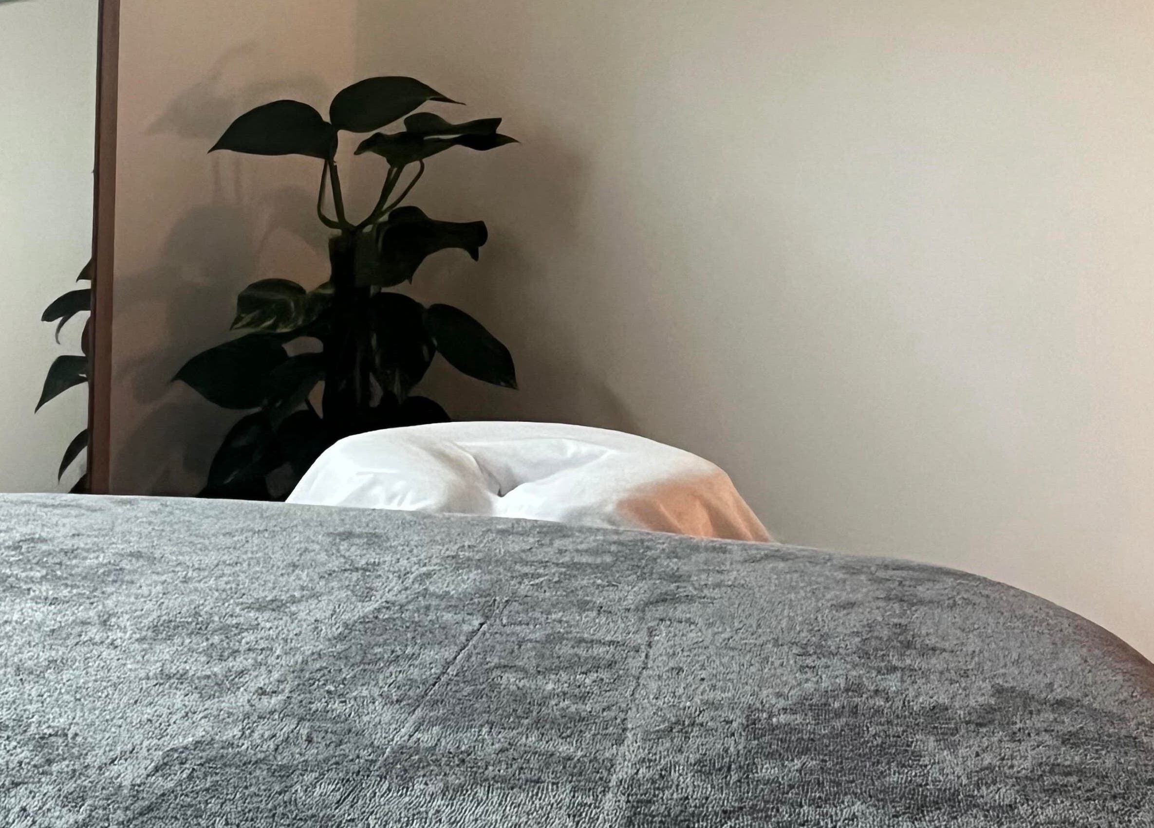 Relaxing massage table at Alpas Massage Therapy - Bridge of Earn, Scotland, GB, offering a tranquil environment.