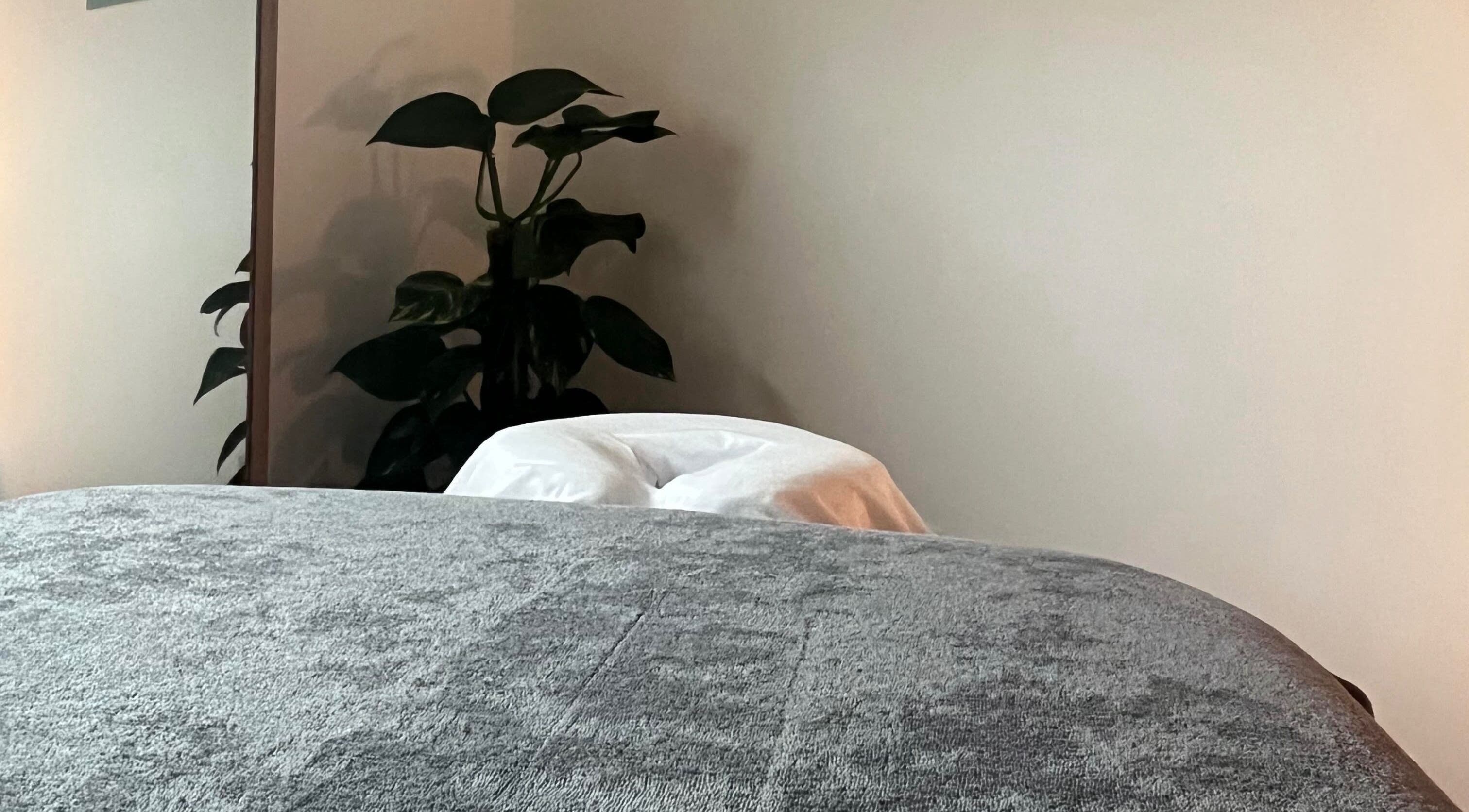 Relaxing massage table at Alpas Massage Therapy - Bridge of Earn, Scotland, GB, offering a tranquil environment.