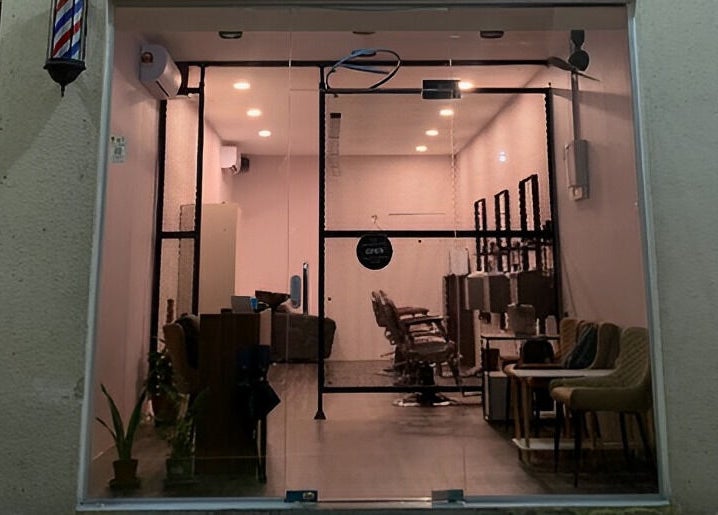 Entrance view of The Barbersmith Damansara in Petaling Jaya, Selangor showcases modern interior design.