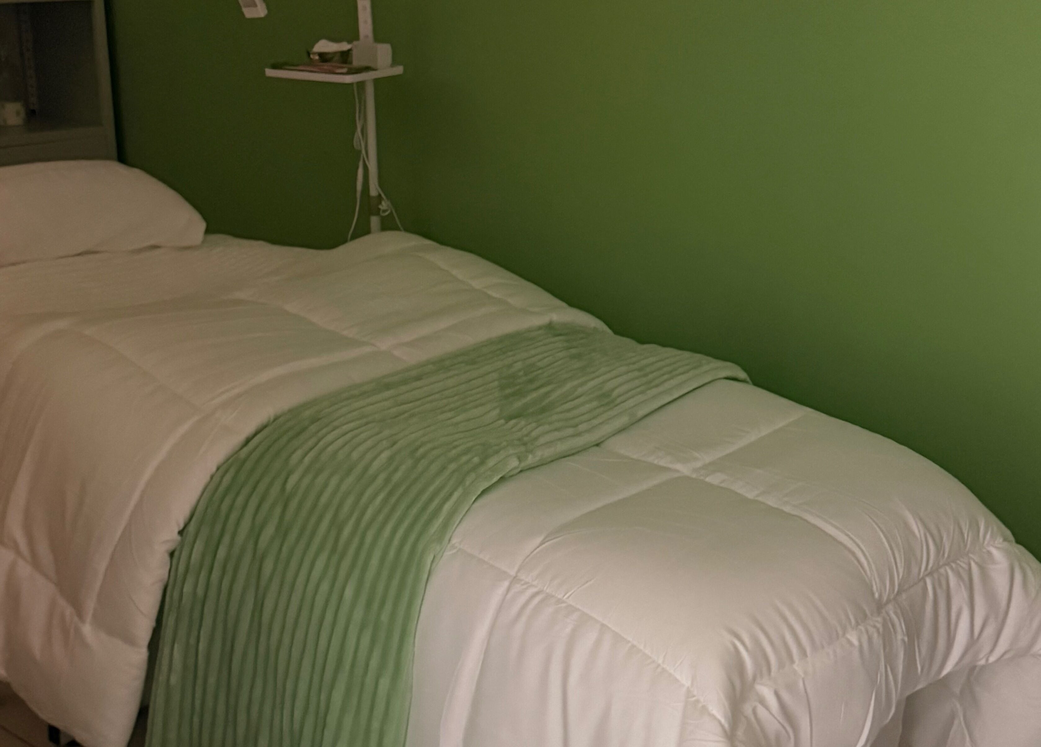 Calming spa treatment room at Live Simply Organic Wellness Spa in Kingston, St. Andrew Parish, JM.