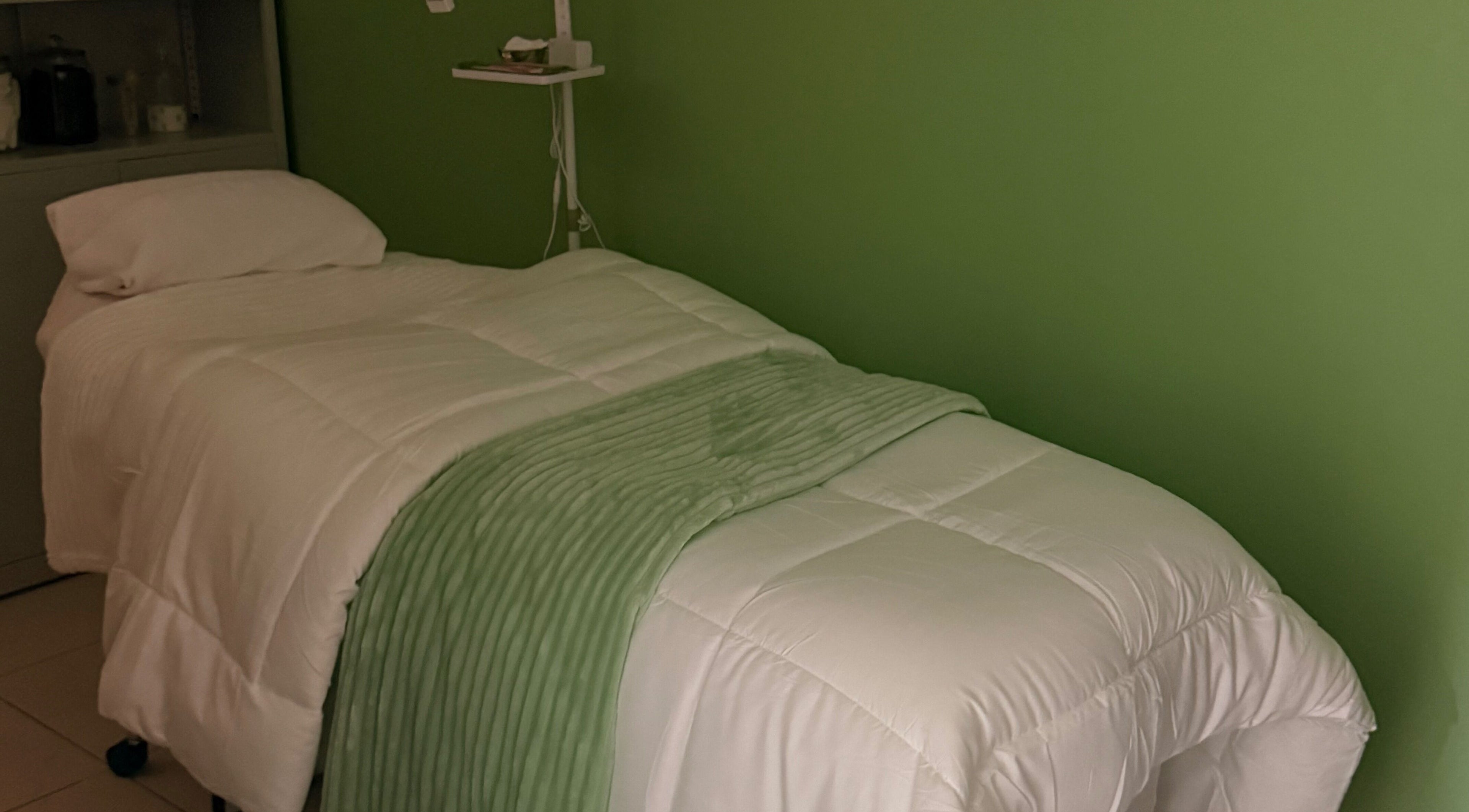 Calming spa treatment room at Live Simply Organic Wellness Spa in Kingston, St. Andrew Parish, JM.