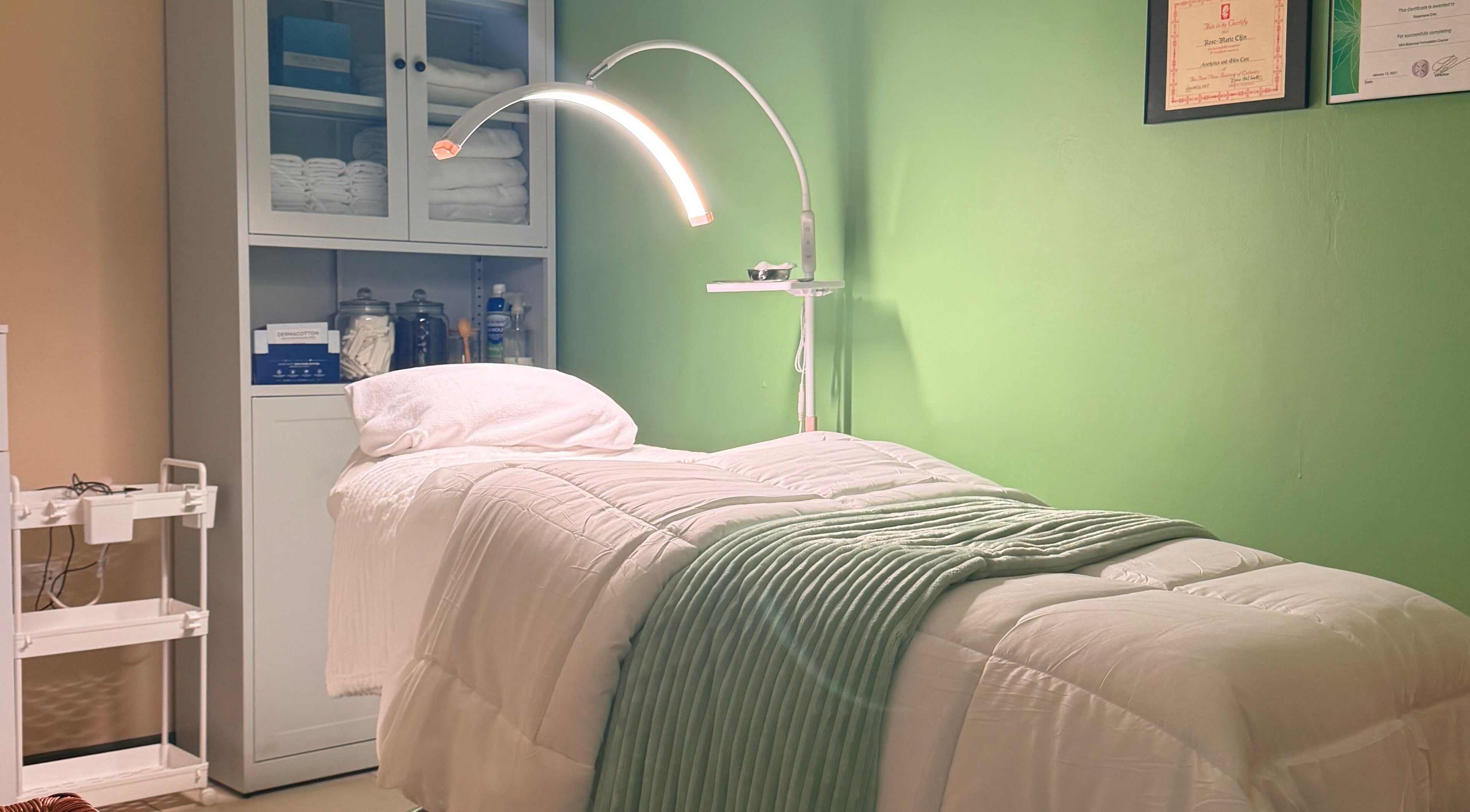 Tranquil treatment room at Live Simply Organic Wellness Spa, Kingston, St. Andrew Parish, JM, with cozy bed.