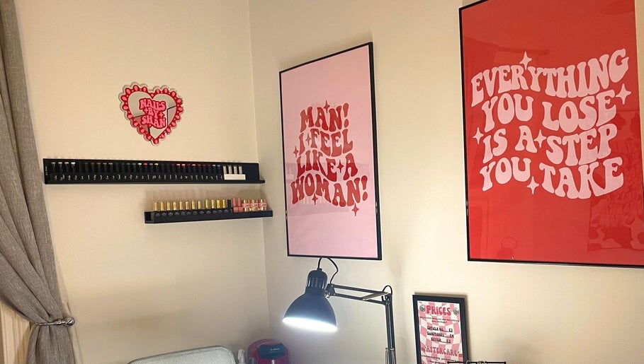 Stylish nail care setup at Nails by Shan in Cleckheaton, England, GB with vibrant wall art.