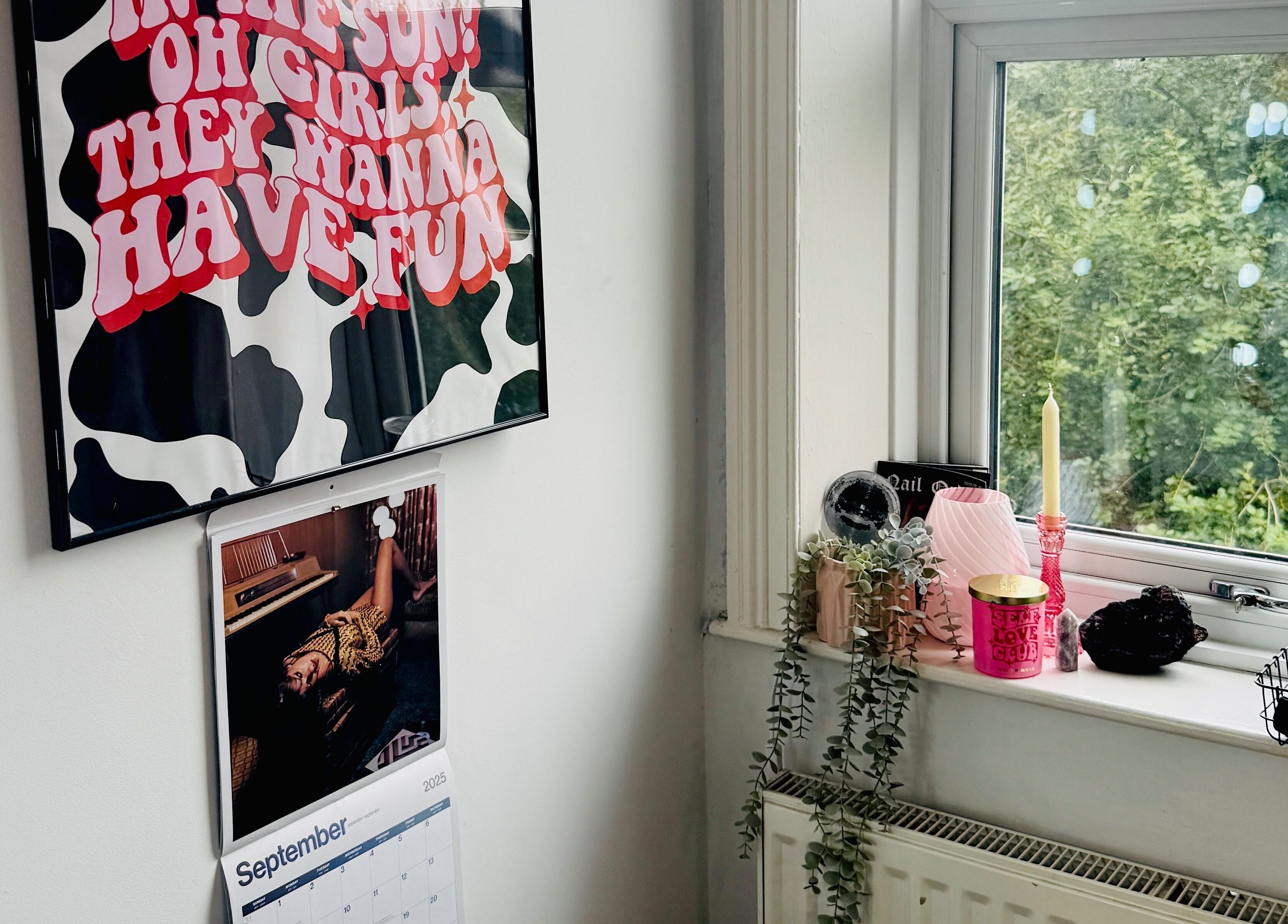 Chic decor at Nails by Shan, Cleckheaton, England, GB, featuring wall art and vibrant plants by the window.