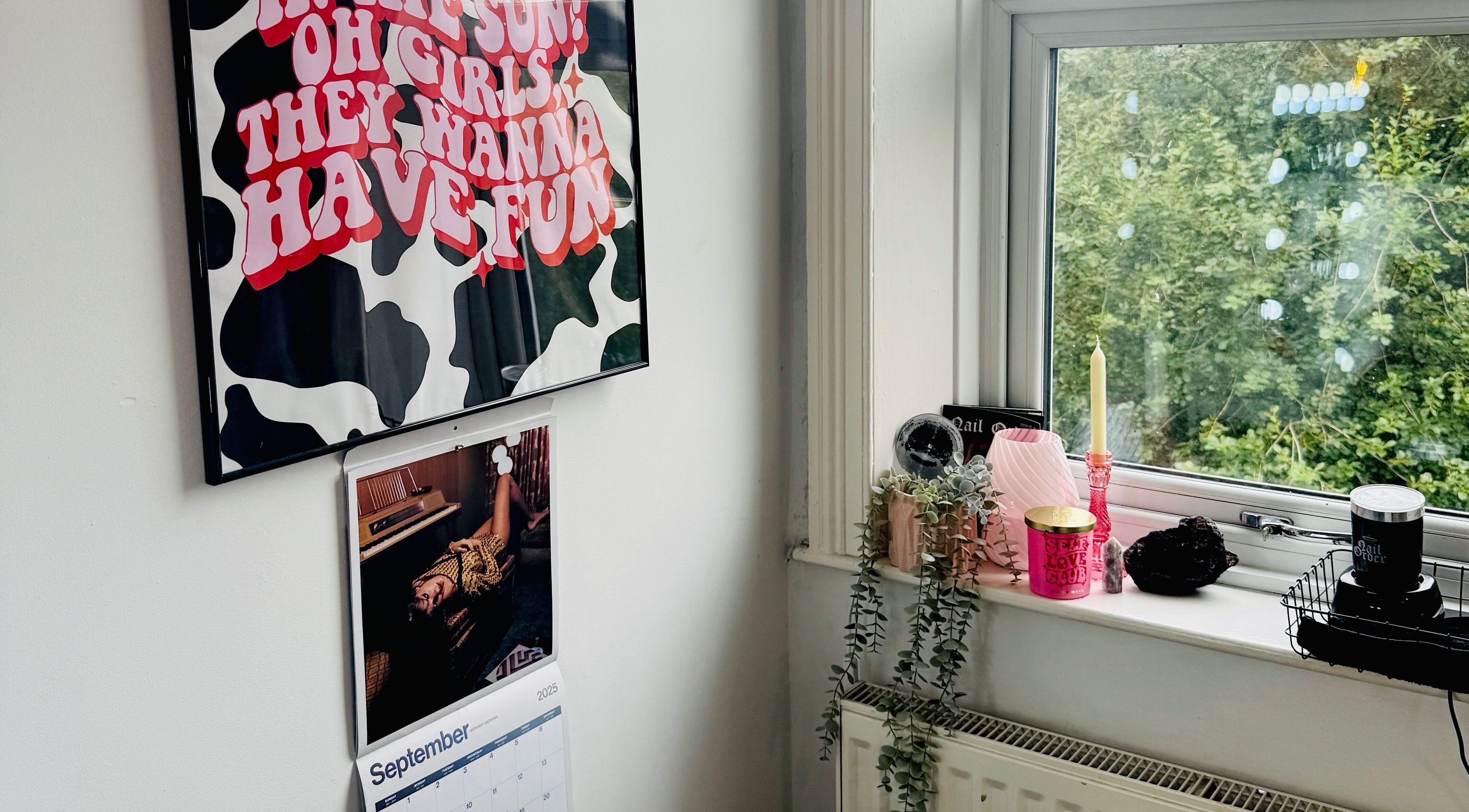 Chic decor at Nails by Shan, Cleckheaton, England, GB, featuring wall art and vibrant plants by the window.