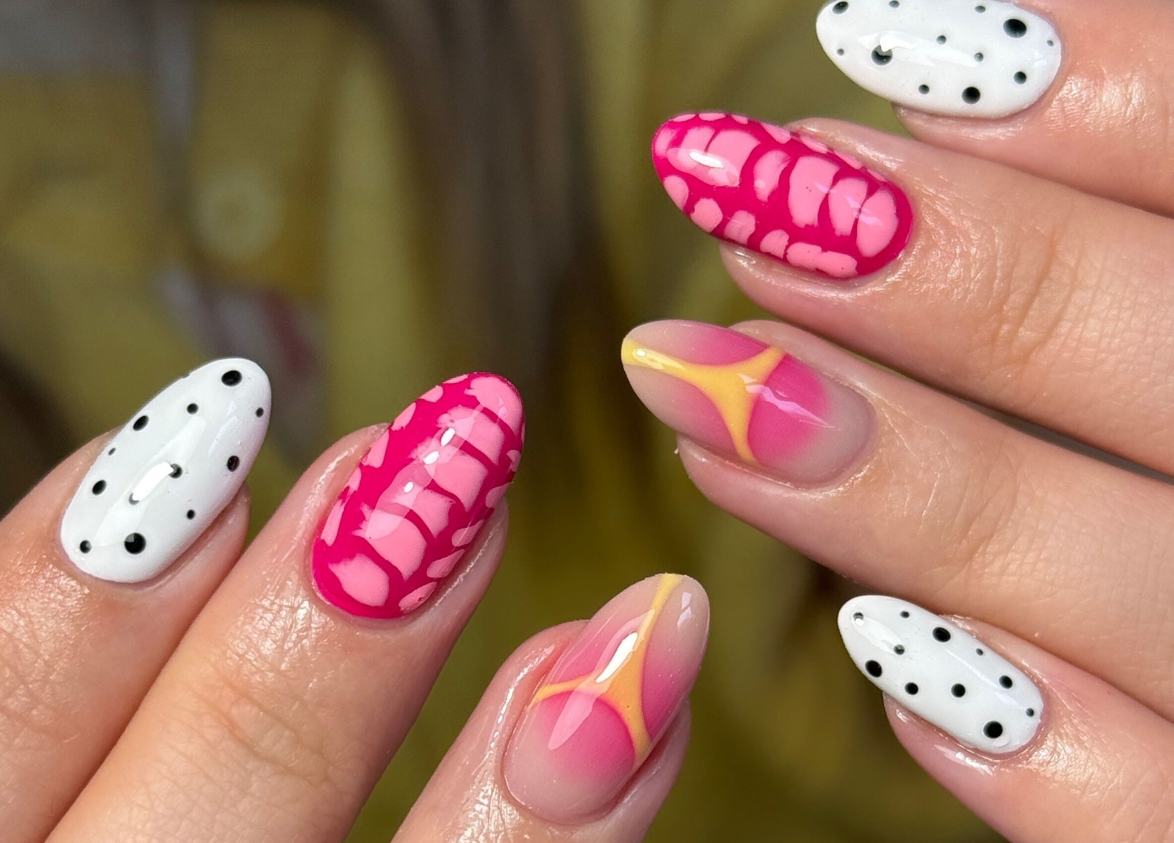 Creative nail art featuring pink and white designs at Nails by Shan, Cleckheaton, England, GB.