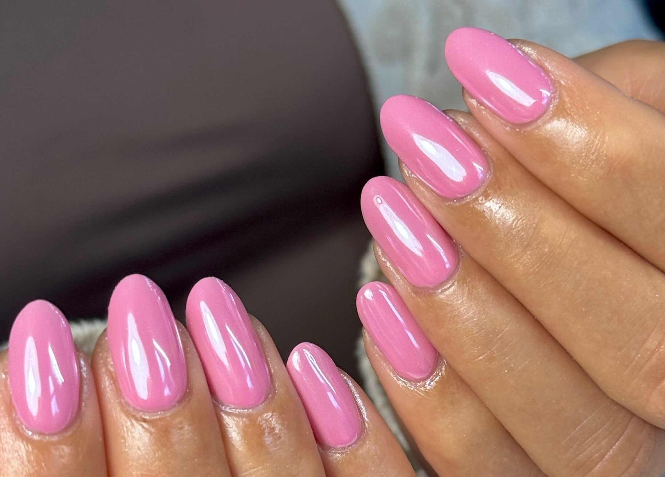 Pink gel manicure at Nails by Shan in Cleckheaton, England, GB showcases elegant nail art.