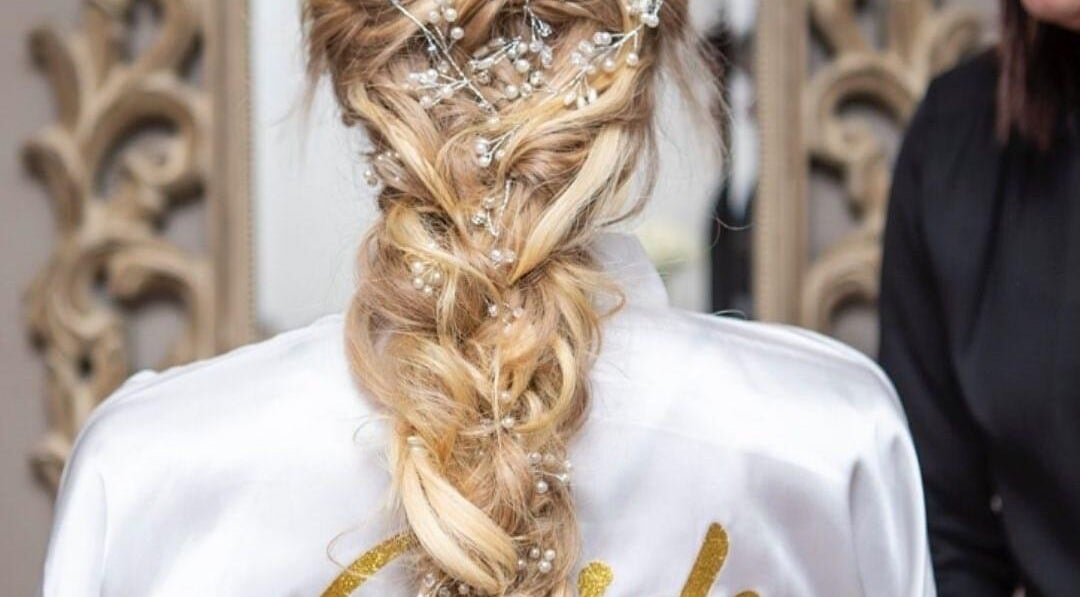 Intricate bridal hairstyle with pearls at Cindy-Lee Hair Professional, Johannesburg, Gauteng, ZA.