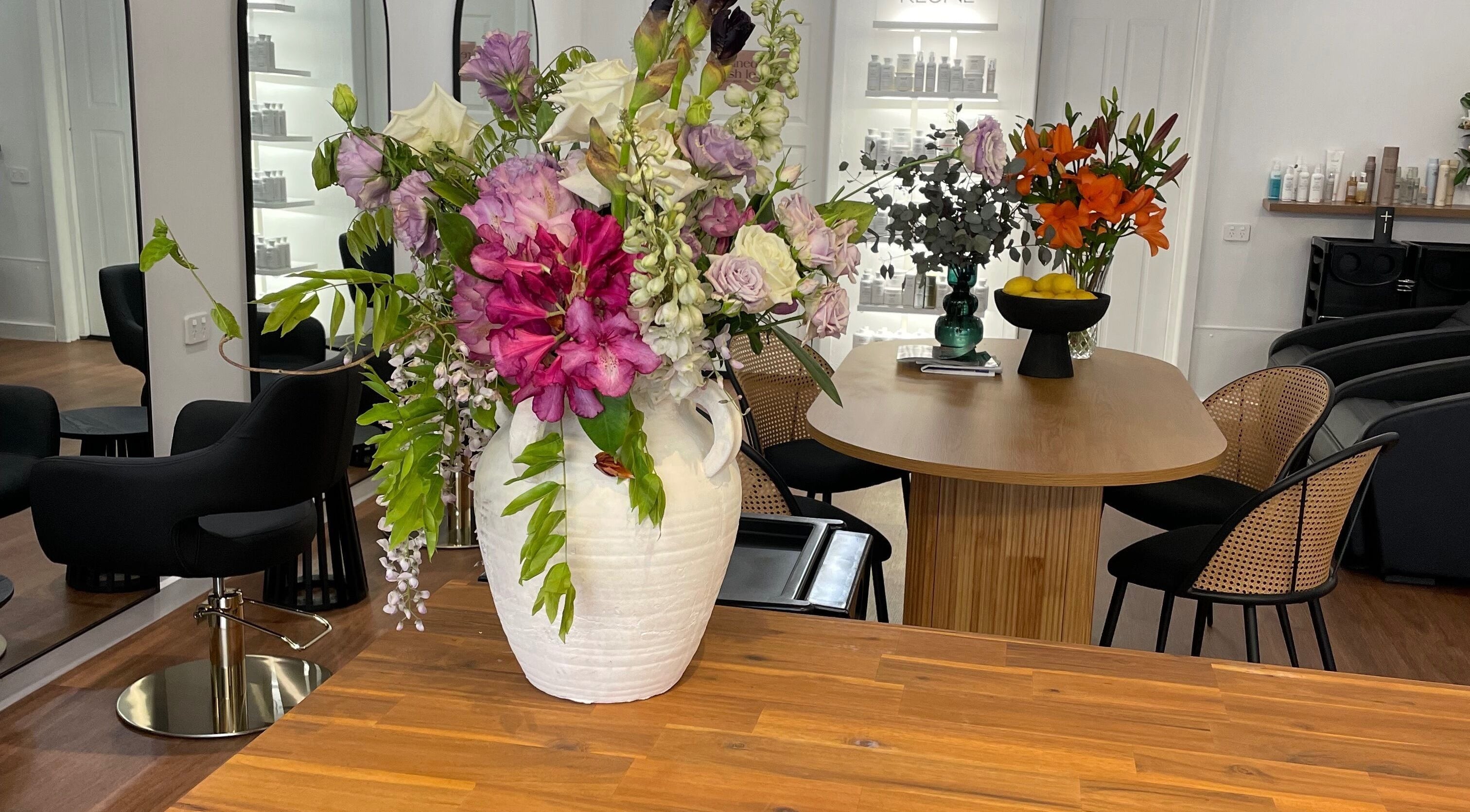 Elegant floral arrangement at Soho Hair Artistry, Kyneton, Victoria, AU, enhancing the salon's welcoming ambiance.