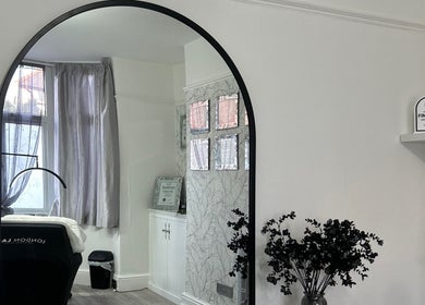 Stylish beauty room at Libby.J.Beauty, Exmouth, England, GB with a large mirror and elegant decor.