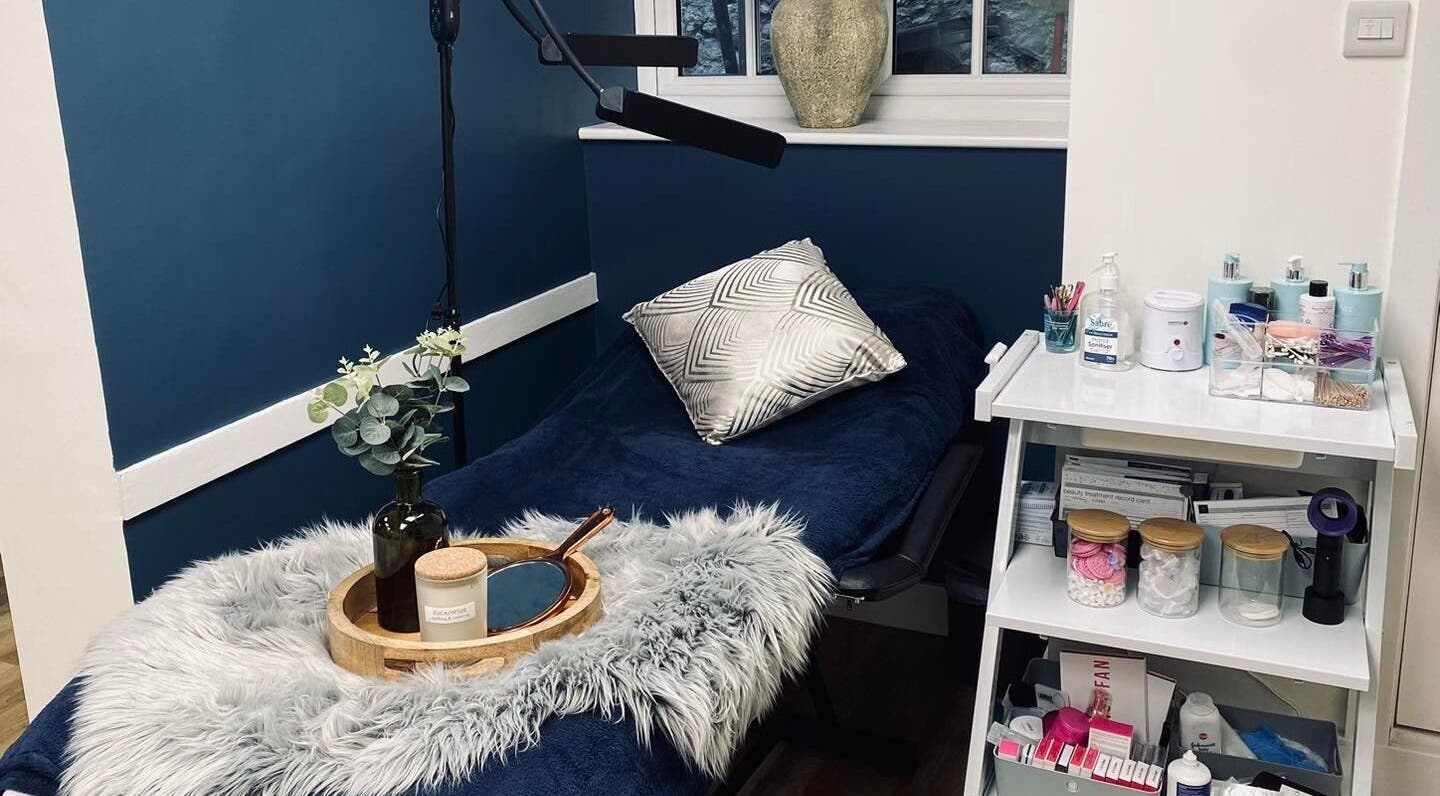 Relaxing spa room at Tara Peters Hairdressing in Seaton, England, GB, featuring a fluffy pillow and beauty products.