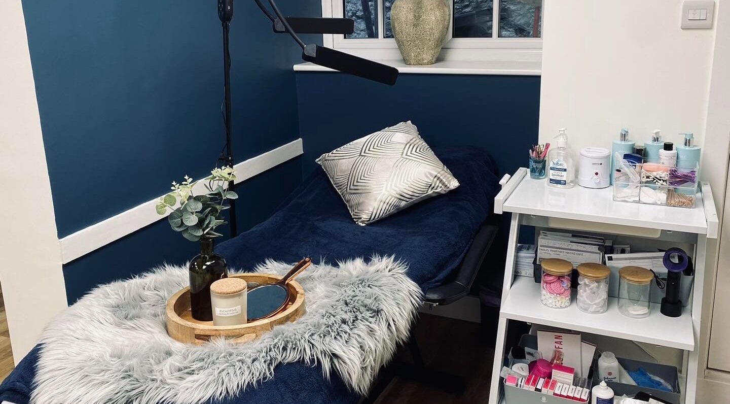 Relaxing spa room at Tara Peters Hairdressing in Seaton, England, GB, featuring a fluffy pillow and beauty products.