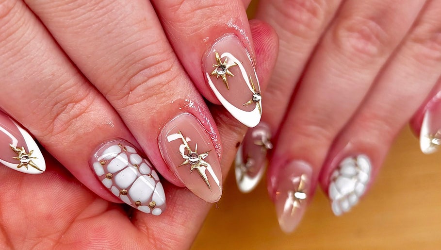 Elegant nail art with gold accents at JB Nails - Jordie Barber, Plymouth, England, GB.