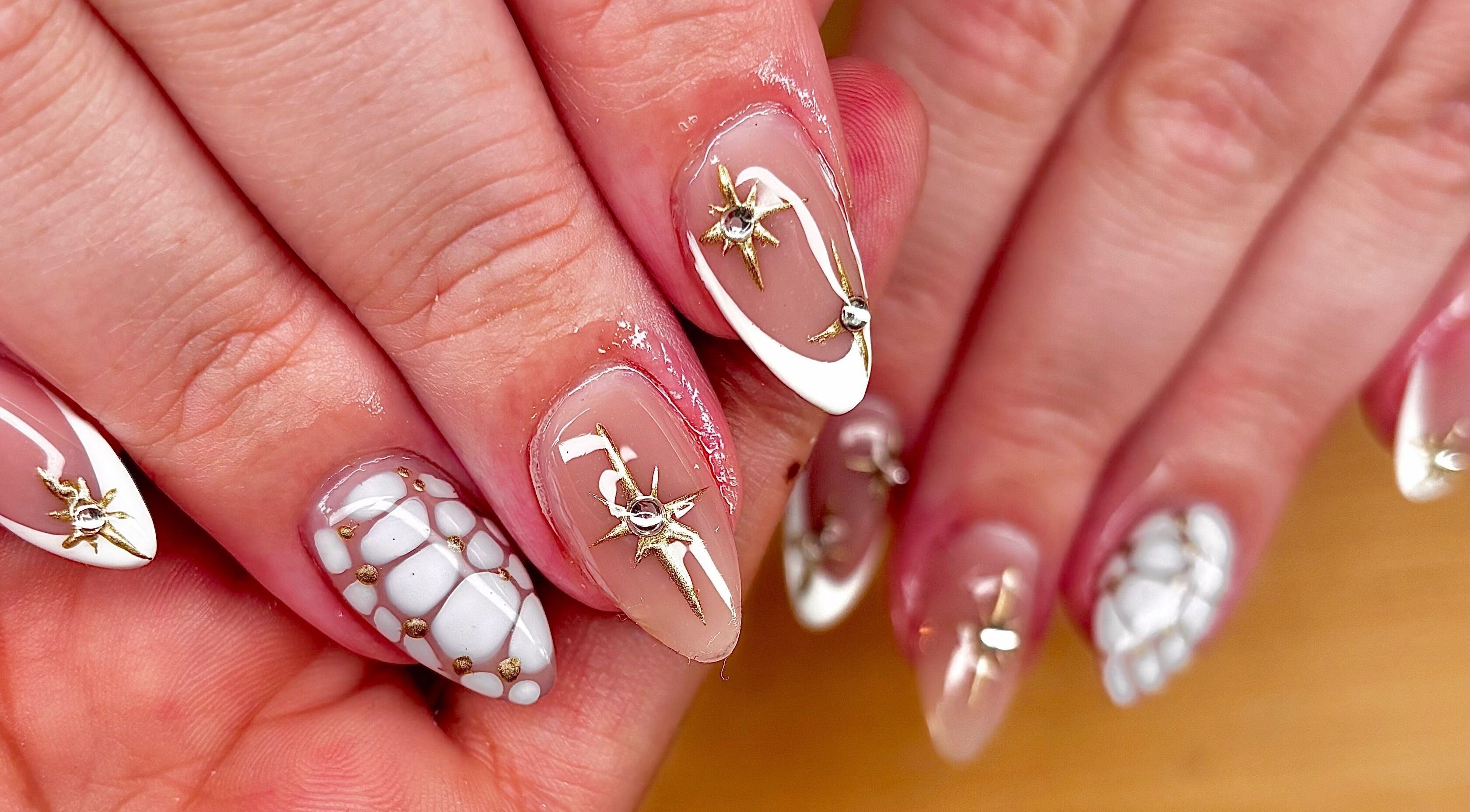 Elegant nail art with gold accents at JB Nails - Jordie Barber, Plymouth, England, GB.