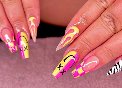 Colorful nail art design at JB Nails - Jordie Barber, Plymouth, England, GB showcases vibrant colors and patterns.