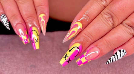 Colorful nail art design at JB Nails - Jordie Barber, Plymouth, England, GB showcases vibrant colors and patterns.