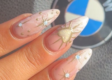 Intricate nail art design at JB Nails - Jordie Barber, Plymouth, England, GB with gold accents and pearls.