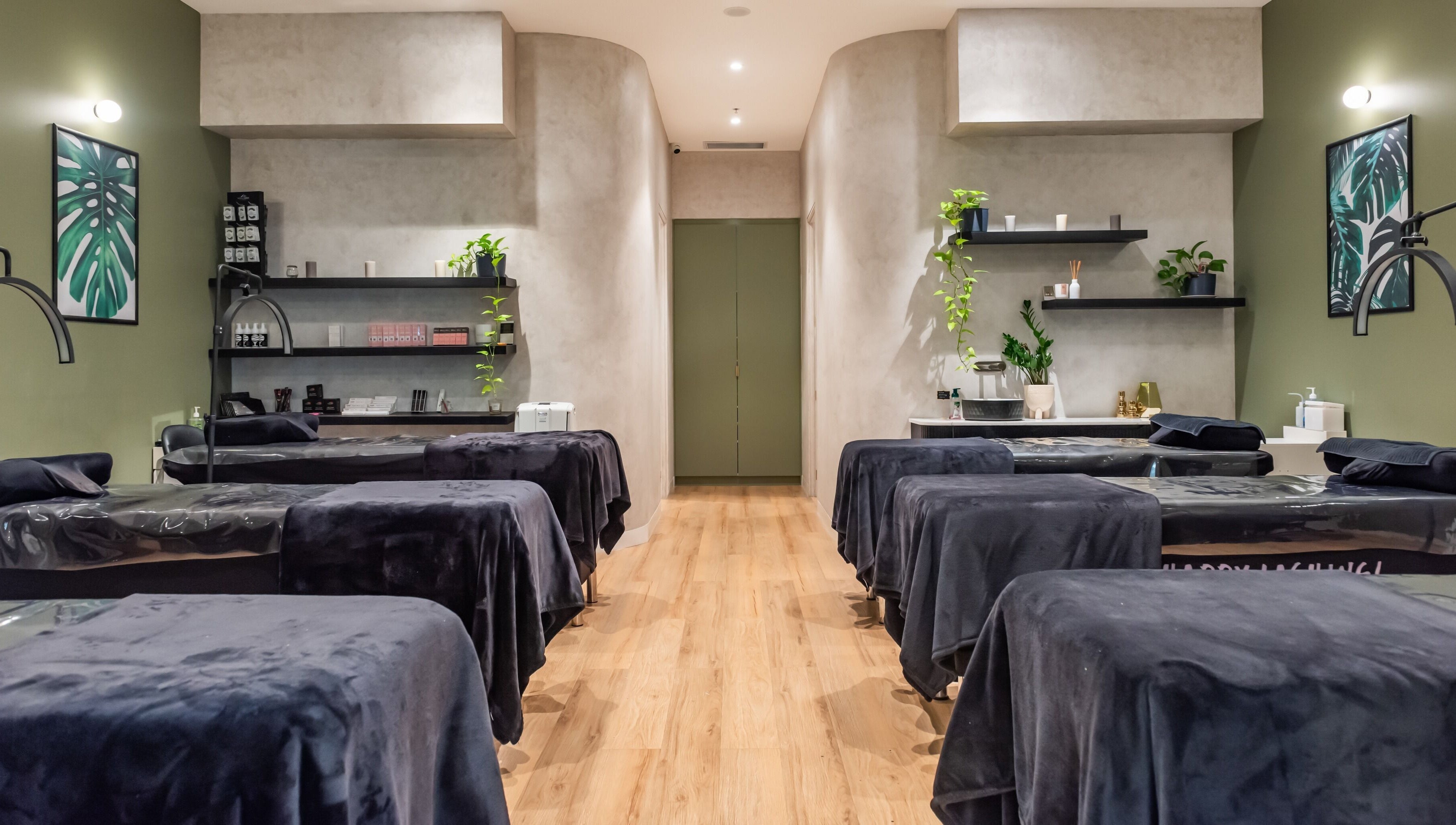 Calm treatment room at Nova Beauty Charlestown, Charlestown, New South Wales, AU with modern decor and massage beds.