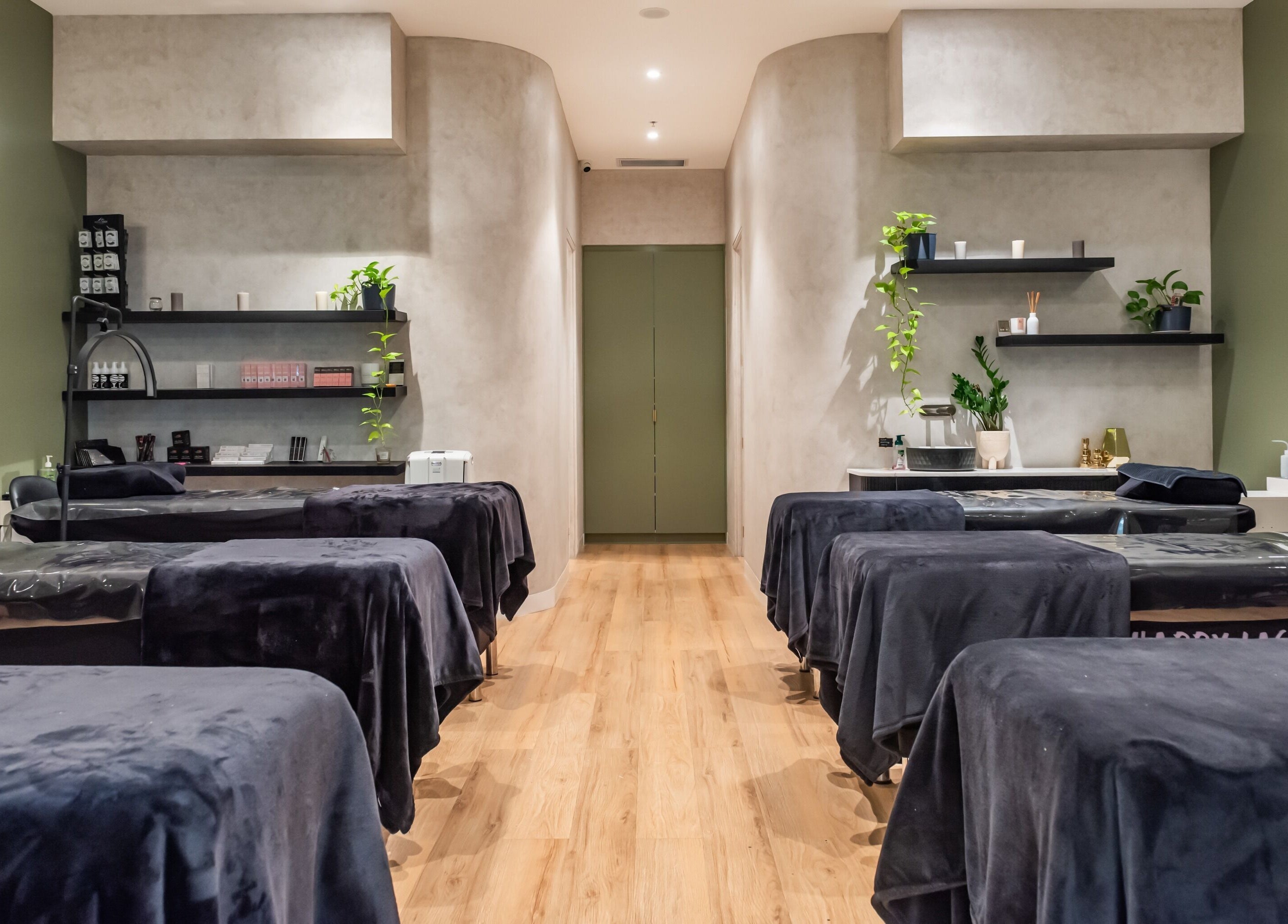 Calm treatment room at Nova Beauty Charlestown, Charlestown, New South Wales, AU with modern decor and massage beds.