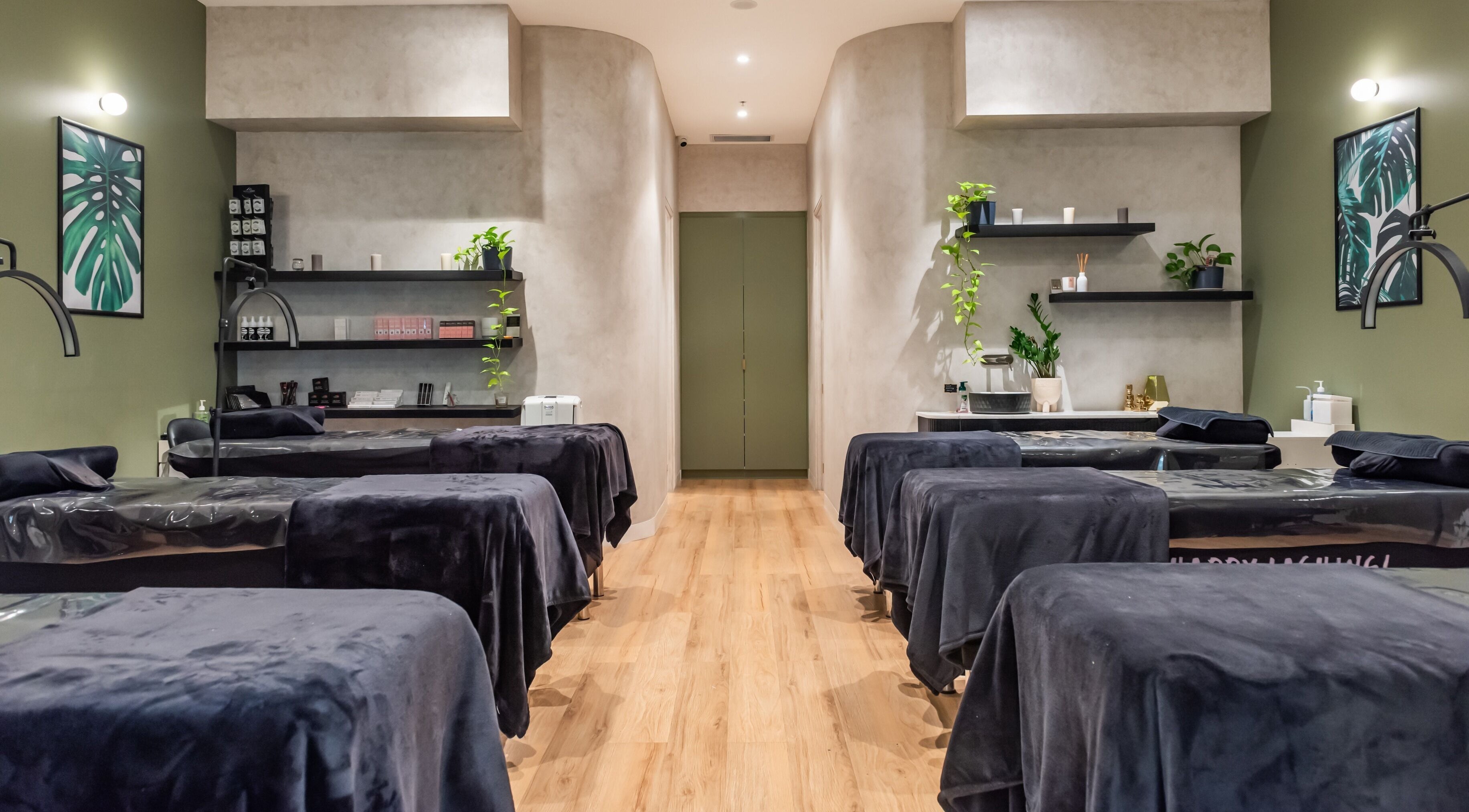 Calm treatment room at Nova Beauty Charlestown, Charlestown, New South Wales, AU with modern decor and massage beds.