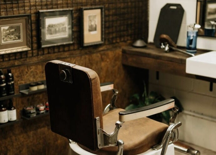 Vintage barber chair in Brookvale - Benicky and Sons, New South Wales, AU. Cozy and stylish decor.