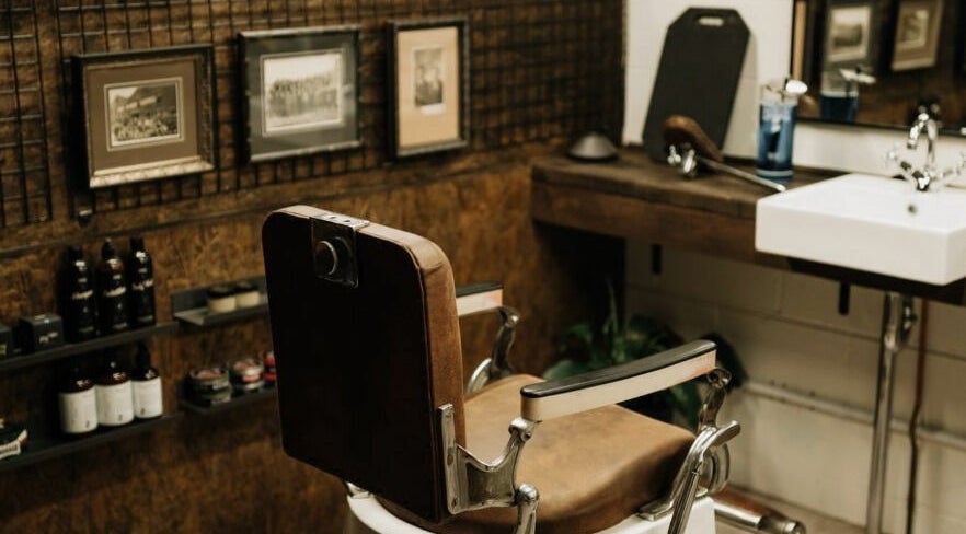 Vintage barber chair in Brookvale - Benicky and Sons, New South Wales, AU. Cozy and stylish decor.