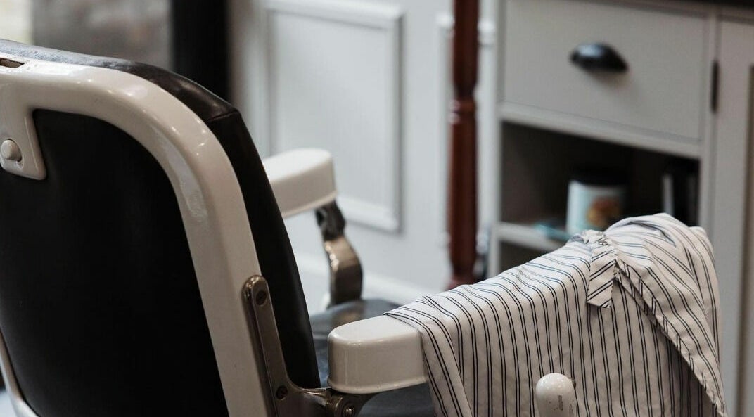 Classic barber chair at Brookvale - Benicky and Sons, Brookvale, New South Wales, AU.