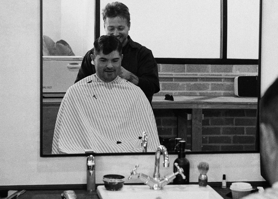Gentleman getting haircut at Brookvale - Benicky and Sons, Brookvale, New South Wales, AU.