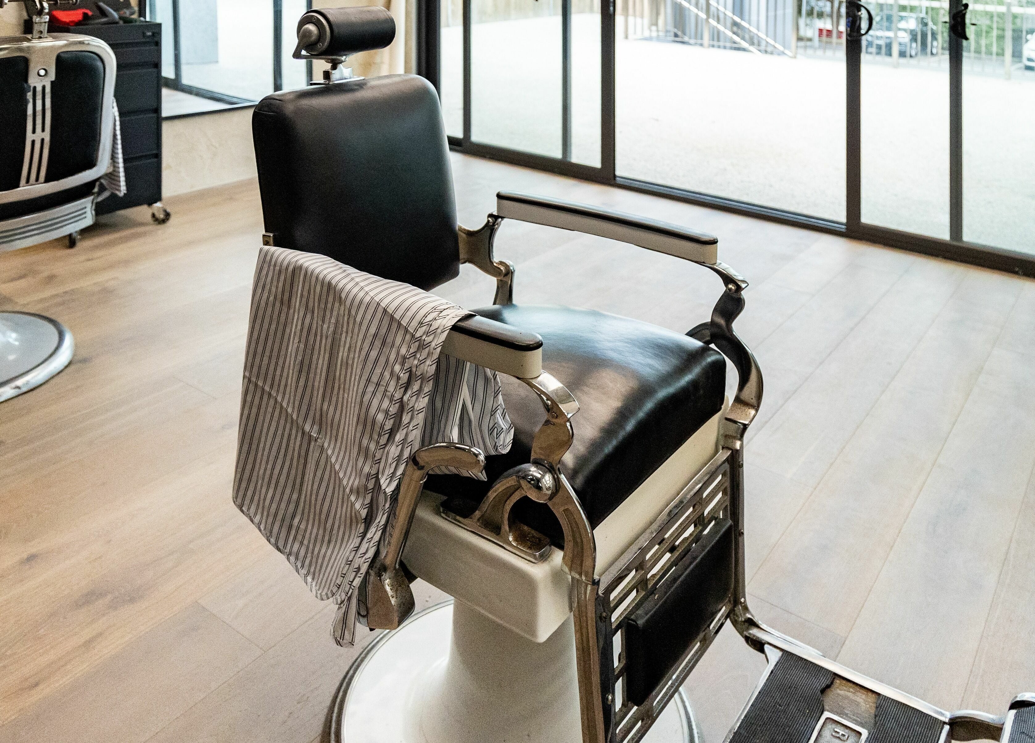 Vintage barber chair at Nth Turramurra - Benicky and Sons, North Turramurra, New South Wales, AU.