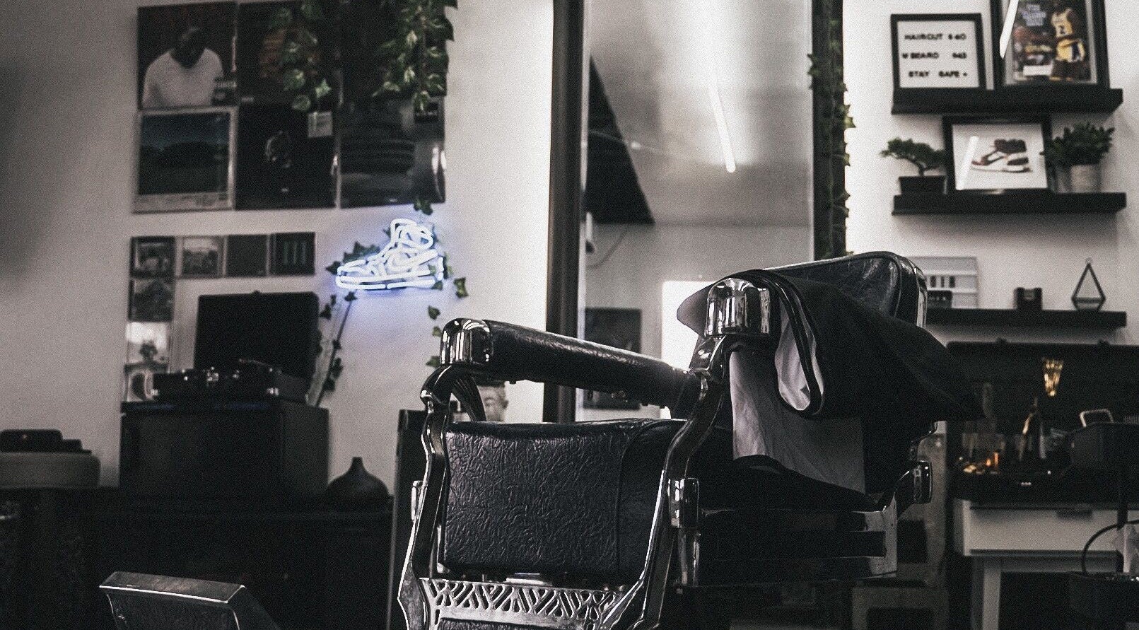 Elegant barber chair at Le Studio Noir, Whitby, Ontario, CA, showcasing a modern and stylish interior design.