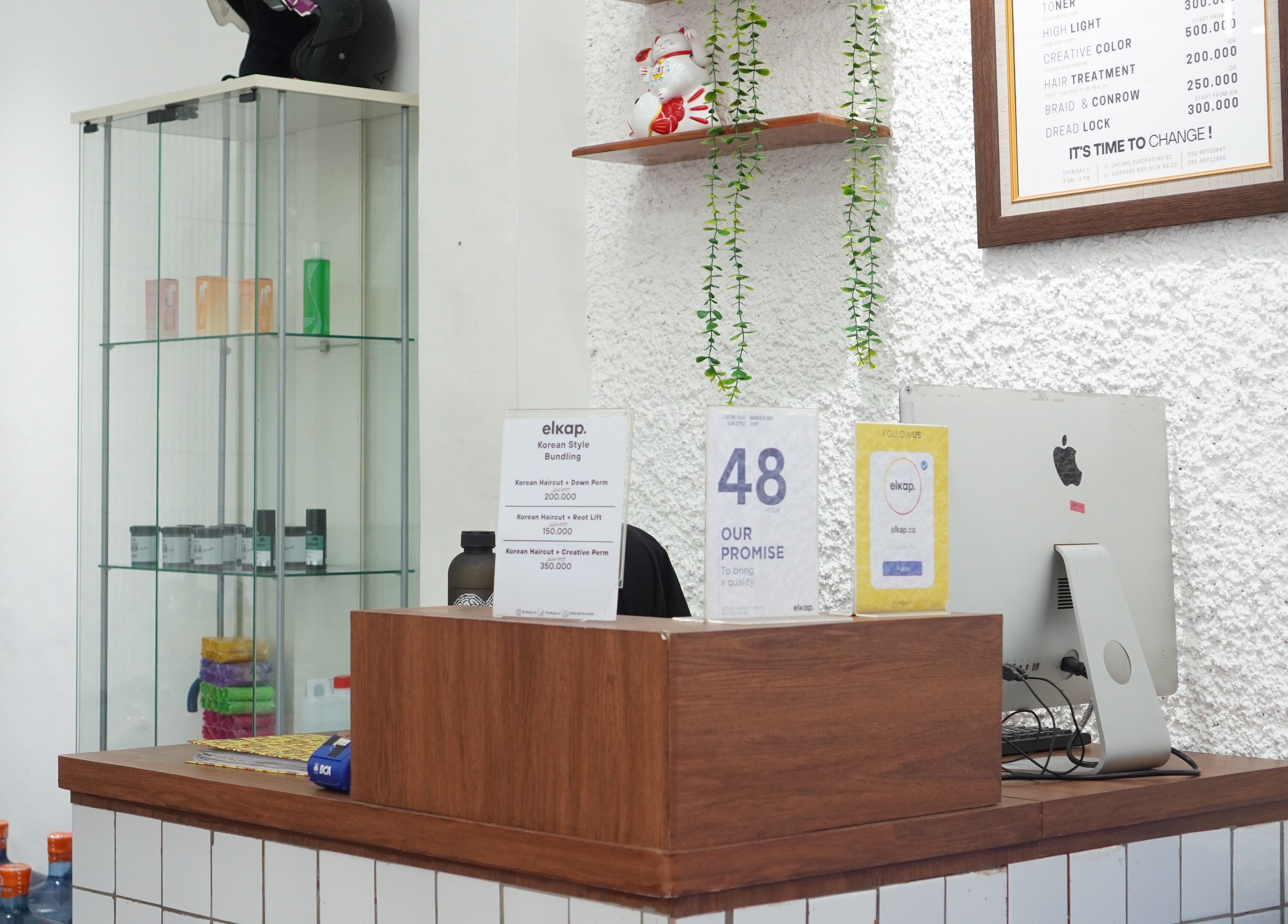 Reception desk at Elkap Gading, Jawa Timur; welcoming and stylish with product displays.