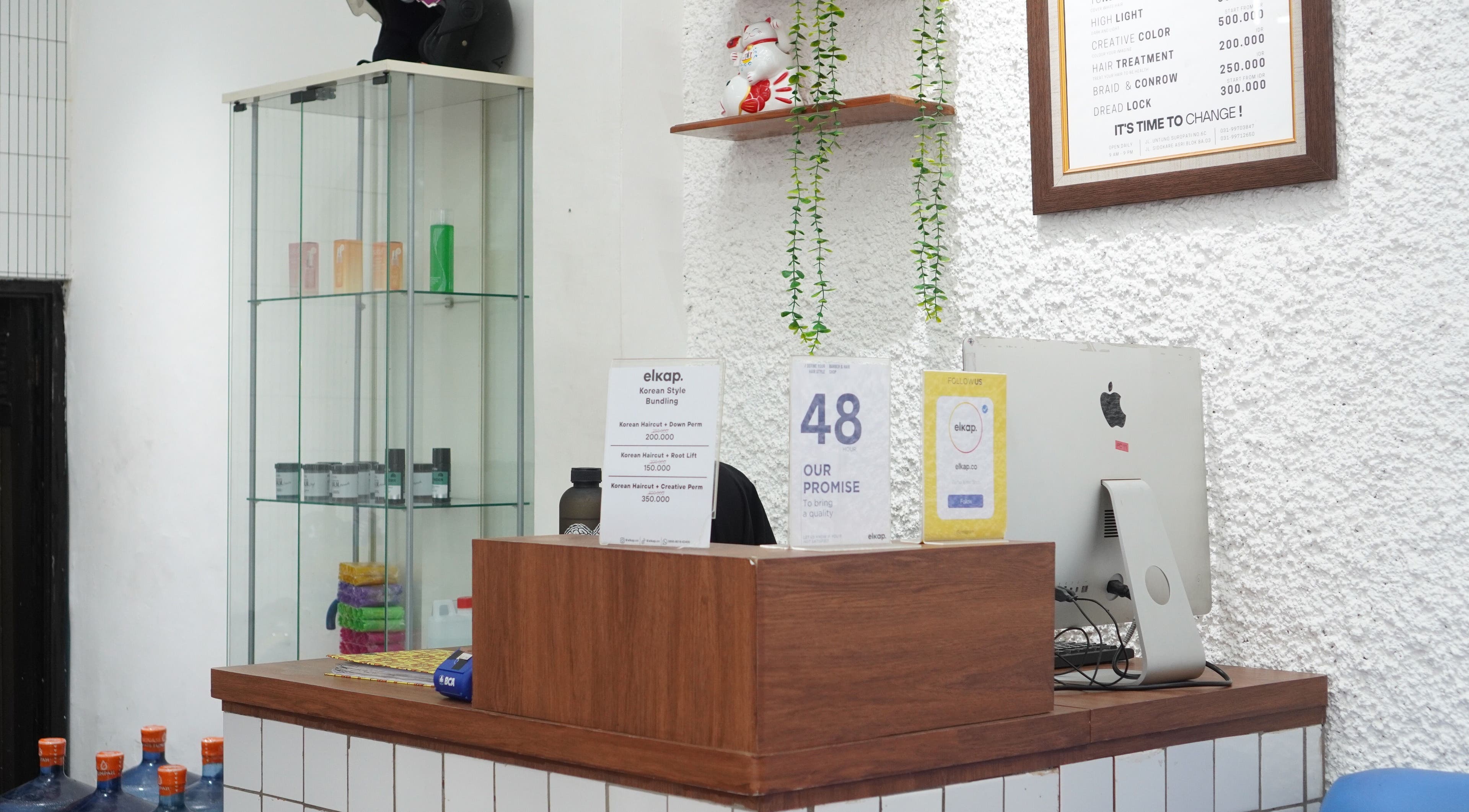 Reception desk at Elkap Gading, Jawa Timur; welcoming and stylish with product displays.