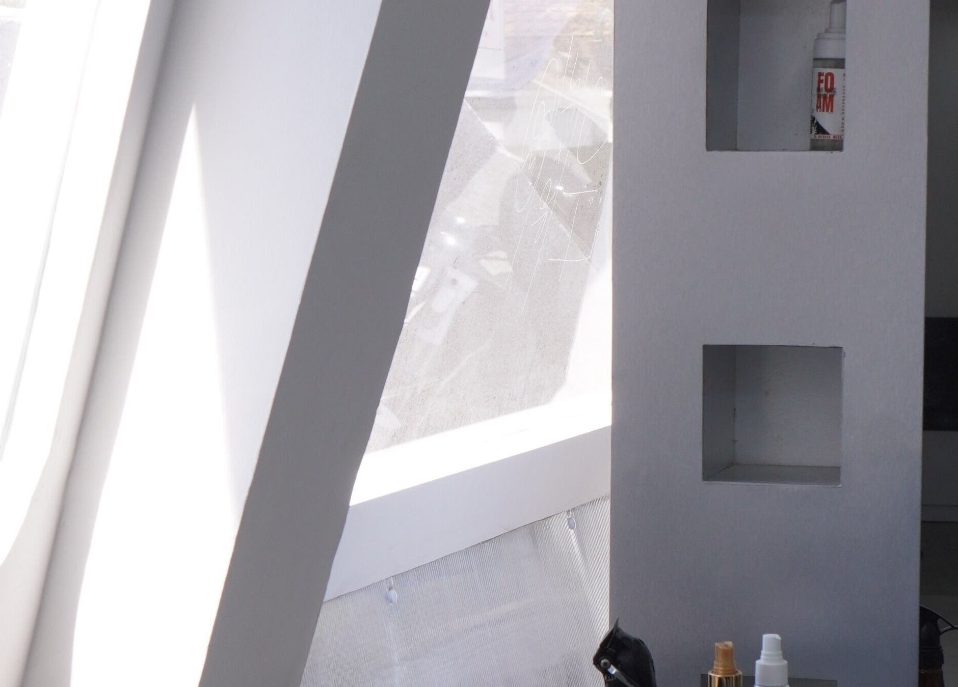 Modern beauty corner at ELKAP TRUNOJOYO, Jawa Timur, Jawa Timur, ID featuring sleek shelves and sunlight.