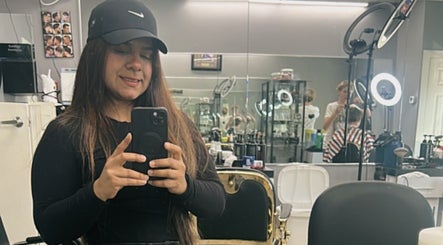Mildred Barber in Stamford, Connecticut: Stylist captures a moment in a modern salon setting.