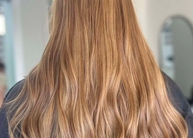 Beautiful long hair styled at Lucy Whatnell Hairdressing, Newbiggin-by-the-Sea, Northumberland, GB.