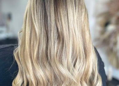 Blonde hair with soft curls at Lucy Whatnell Hairdressing, Newbiggin-by-the-Sea, Northumberland, GB salon.