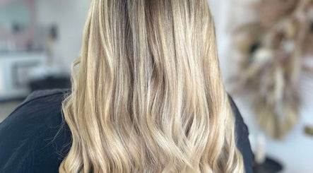 Blonde hair with soft curls at Lucy Whatnell Hairdressing, Newbiggin-by-the-Sea, Northumberland, GB salon.
