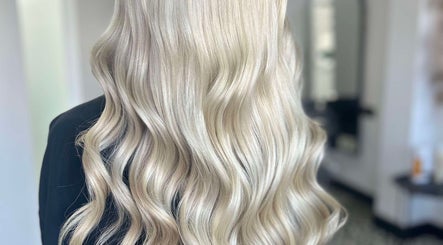 Blonde wavy hairstyle at Lucy Whatnell Hairdressing in Newbiggin-by-the-Sea, Northumberland, GB.