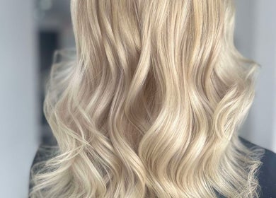 Blonde waves styled at Lucy Whatnell Hairdressing in Newbiggin-by-the-Sea, Northumberland, GB.