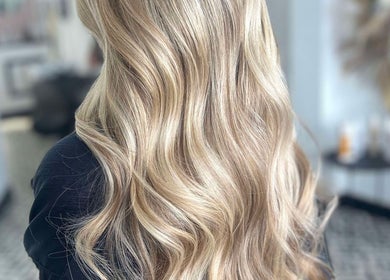 Stylish blonde waves at Lucy Whatnell Hairdressing, Newbiggin-by-the-Sea, Northumberland, GB salon.